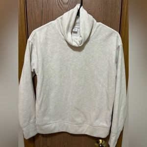 Woman’s turtle neck sweater